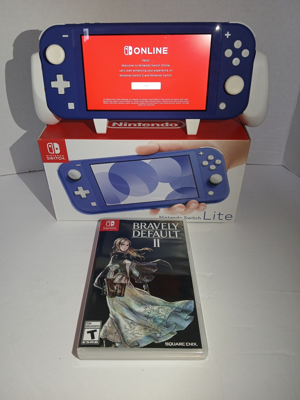 Nintendo Switch Lite Blue Handheld Console with Bravely Default II